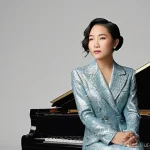 Hebe Tien과 S H E에서 솔로 활동으로의 변화 - **Prompt: Hebe Tien's Solo Artistic Journey**
    A full-body portrait of Hebe Tien, aged in her lat...